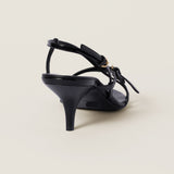 Patent leather sandals with buckles