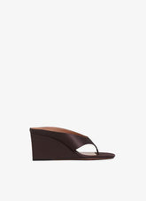 ALAIA DARK BROWN CUBE THONG MULES IN SATIN