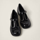 Brushed leather T-strap brogue shoes
