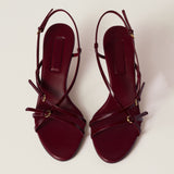 Patent leather sandals with buckles