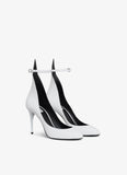 DECOLLETE PUMPS IN PATENT LEATHER WHILE