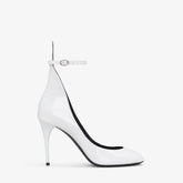 DECOLLETE PUMPS IN PATENT LEATHER WHILE