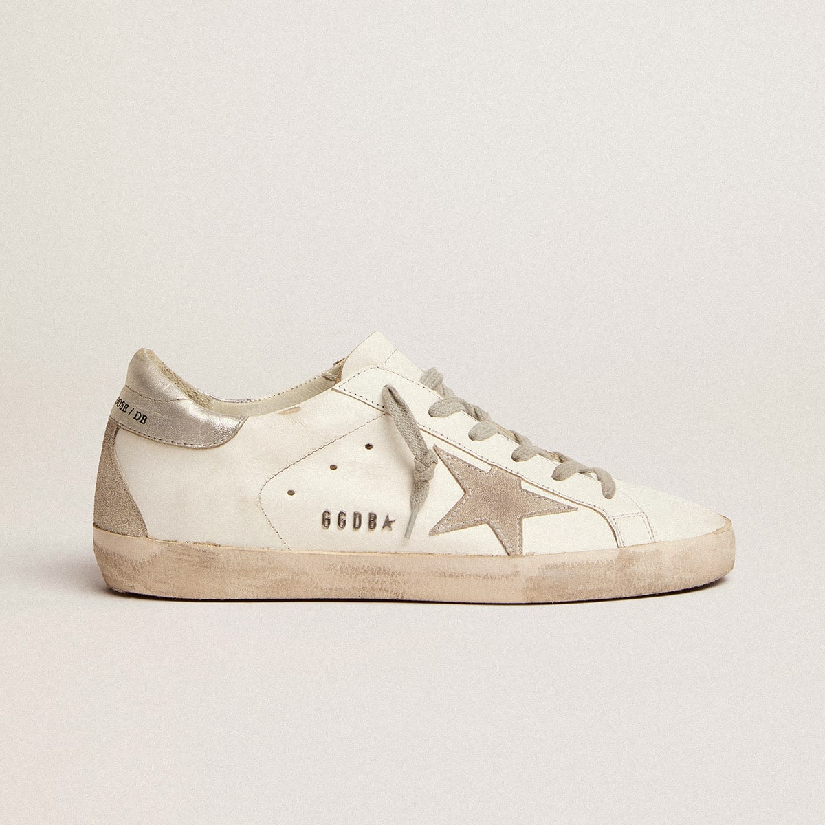 goldengoose Super-Star with silver heel tab and metal stud lettering