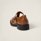 Brushed leather T-strap brogue shoes