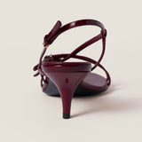 Patent leather sandals with buckles