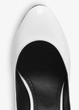 DECOLLETE PUMPS IN PATENT LEATHER WHILE