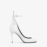 DECOLLETE PUMPS IN PATENT LEATHER WHILE